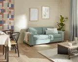 Canapé bleu menthe, papier peint géométrique et tableaux d'art : la tendance peinture salon est ici !