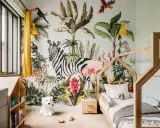 Une chambre d'enfant avec un mur jungle : zèbre, flamant rose, léopard, singe, toucan. Une excellente idée déco chambre enfant pour l'aventure !