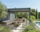 Un élégant pool house provençal avec salon extérieur, cuisine d'été et piscine, entouré d'oliviers et de lavande.