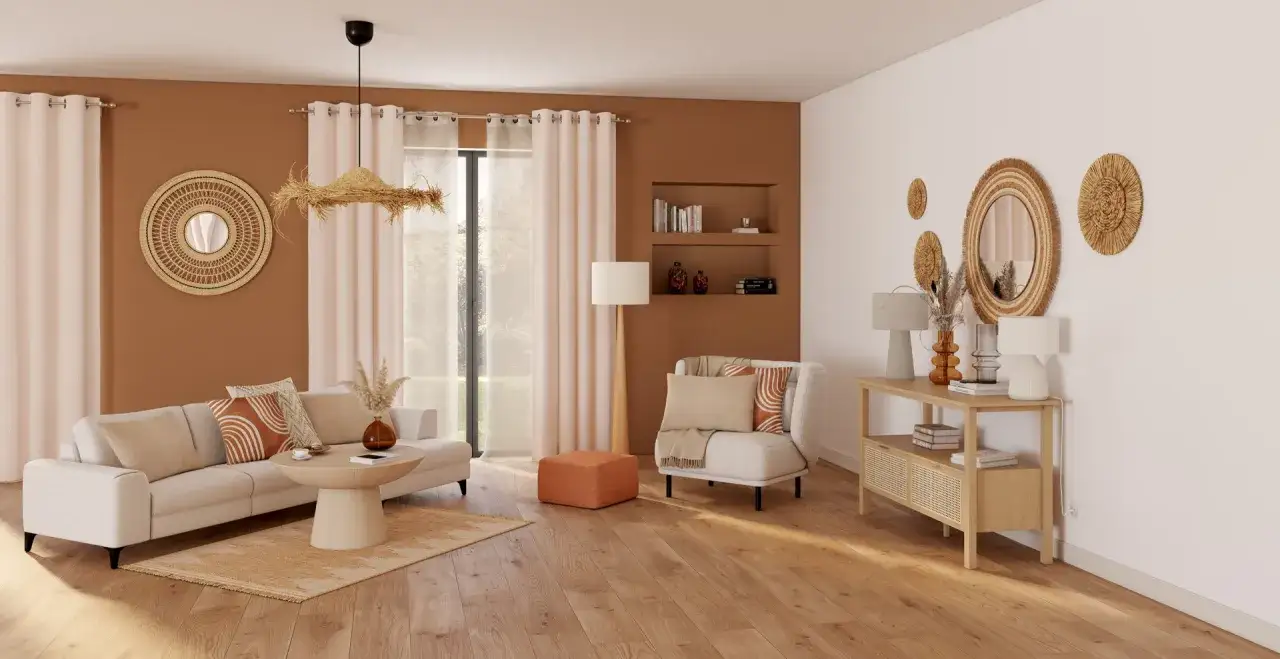 Un salon cocooning bois et blanc, avec un canap&eacute; confortable, des coussins aux motifs g&eacute;om&eacute;triques et des &eacute;l&eacute;ments d&eacute;coratifs en rotin.